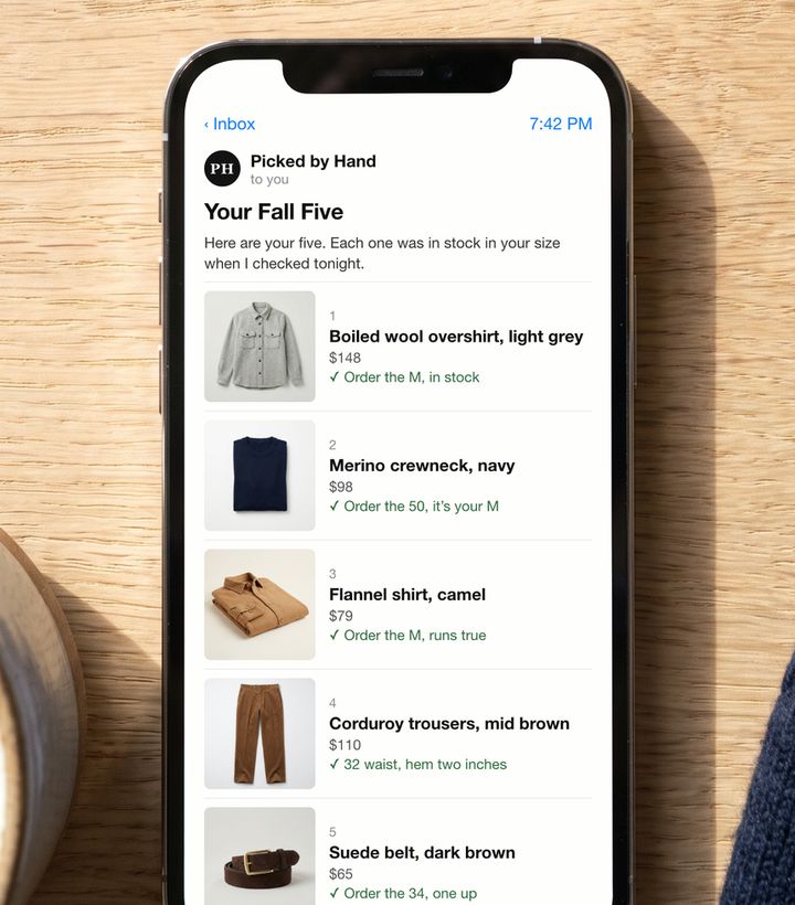 A phone showing the Your Fall Five email: five pieces with photos, prices and the size to order